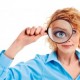 Growth Engineering_Women with a maganfiying glass